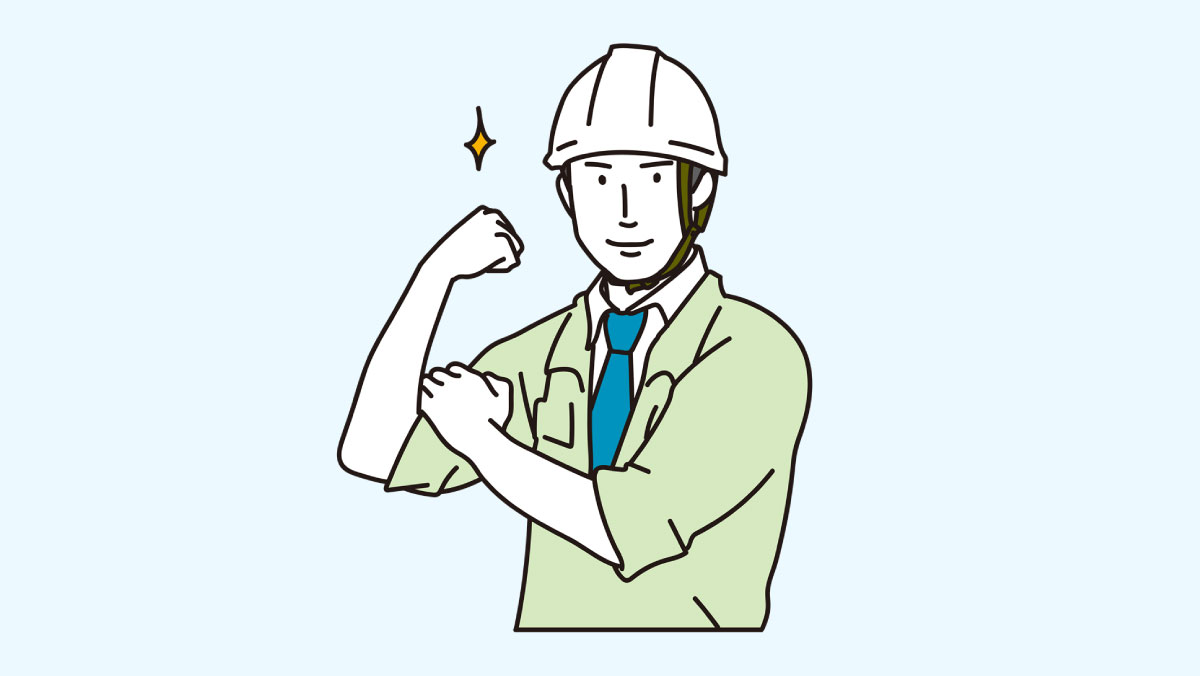 ガッツポーズをする男性